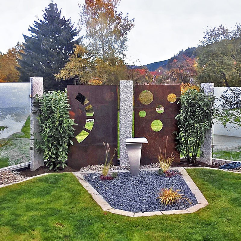 Windschutz mit gelaserten Landschaftsmotiven
